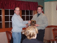 2005 Commissioner Todd Heckenberg presents Steve Nunnikhoven with the Gary Wagner Memorial Land Stewardship Award.