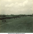 Soldiers lined up on a field, The University of Iowa, 1950s