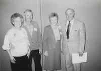 Four unidentified people at conservation awards banquet in 1992