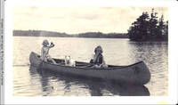 Frindy and Vidie Burden in Canoe with Denise, the dog