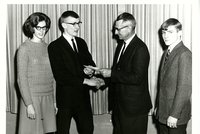 Young man receives an award