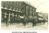 Military marching band in Mecca Day parade, The University of Iowa, 1919