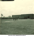 Soldiers in formation near football stadium, The University of Iowa, 1950s