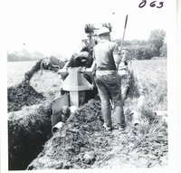 Herman Schwartz farm's tiling project, 1969