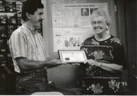 Mike Lewitke Presents Retirement Certificate to Dorothy Davis