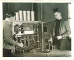 Engineering students working in a technology laboratory with telephones, The University of Iowa, 1939