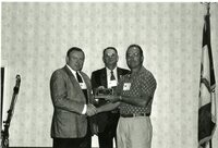 1990s Jeff Bergman receives outstanding commissioner award