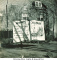 Fraternity house with Homecoming sign, The University of Iowa, November 1940