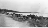Effects of expansion of ice along margin of Clear Lake, Clear Lake, Iowa, late 1890s or early 1900s