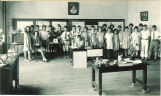 Students posed with teacher for school open house, The University of Iowa, June 1926