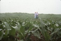 Linda and Dana Sitzmann pose in the newly constructed terrace in the field.