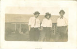 Women posing in men's clothing, Iowa?, 1910s
