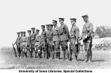 Rifle team cadets standing with awards on Iowa Field during Governor's Day celebration, The University of Iowa, May 13, 1922