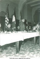 Speaker at microphone in Homecoming event, The University of Iowa, 1940s