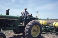 Photograph Collection Of A Man On A Tractor 
