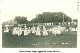 Women dancing around may pole at Iowa Field, The University of Iowa, May 1915