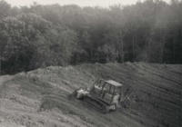 Contractor, Harold Brown, building pond at Camp Wesley Woods.
