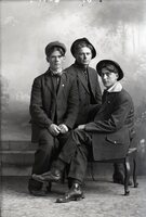 Three men seated