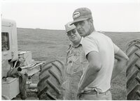 1979  Two farmers between tractors