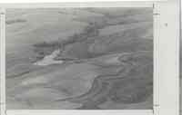 Photograph of contoured land with pond owned by Ron Loutsch
