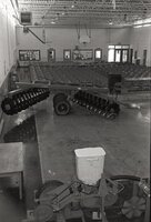 Room with chairs and agricultural equipment