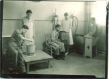 Patients soaking hands and feet at Children's Hospital, The University of Iowa, December 1932