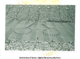 Marching band performing at Kinnick Stadium, The University of Iowa, 1940s?