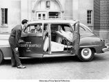Hospital administrators examine an ambulance, The University of Iowa, 1948