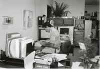1995 Mike Lewitke, District Conservationist, is typing at a desk.