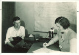 Pauline Tobin filling out travel voucher for Walter Trimble, University Hospital, The University of Iowa, 1930s