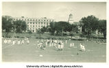 Girls playing ball on field west of Pentacrest, The University of Iowa, 1910s