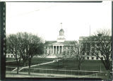 Tennis courts at Hubbard Park with Old Capitol up the hill, The University of Iowa, 1970s