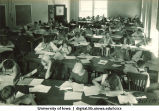 Students taking exam, The University of Iowa, 1920s