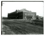 Construction of the west wing of State Gymnasium viewed from the northwest