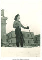 Skier at top of Pentacrest hill, The University of Iowa, 1940s