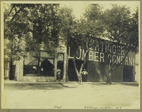 Floyd and D.J. Entinger Stand in front of the Entinger Lumber Company