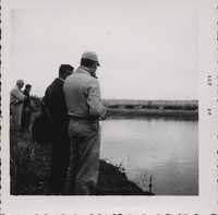 Fishing on the farm pond.