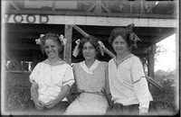 UP532 Three women by river cabin Elmwood
