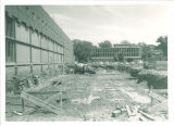 Dismantiling part of Main Library's south wall to add first addition, the University of Iowa, 1961