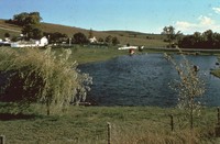 Farm with a pond in Cherokee County, Iowa.