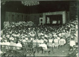 Seated crowd watching an outdoor play, The University of Iowa, 1930s