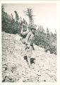 Prof. Clarence Albrecht carrying goat on his back, The University of Iowa, 1920