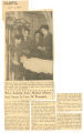 WACs assisting army medical officers and nurses in care of wounded