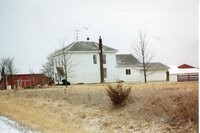 Two views of Bill Moore's house before a windbreak was established