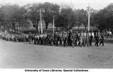 Cadets marching east on Washington Street next to Old Capitol, The University of Iowa, 1913