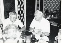 Bob Sogaard on left and three others at a table