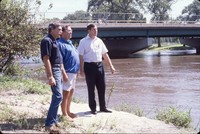 Cherokee County flood committee members meet at the river side to talk about flood control. 