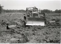 1995  Construction of Ditch Crossing with bulldozer and pipe.