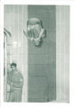 Diver at high school swim meet, The University of Iowa, March 1967