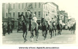 Procession in downtown Iowa City celebrating Iowa victory over Yale in football, The University of Iowa, October 1922